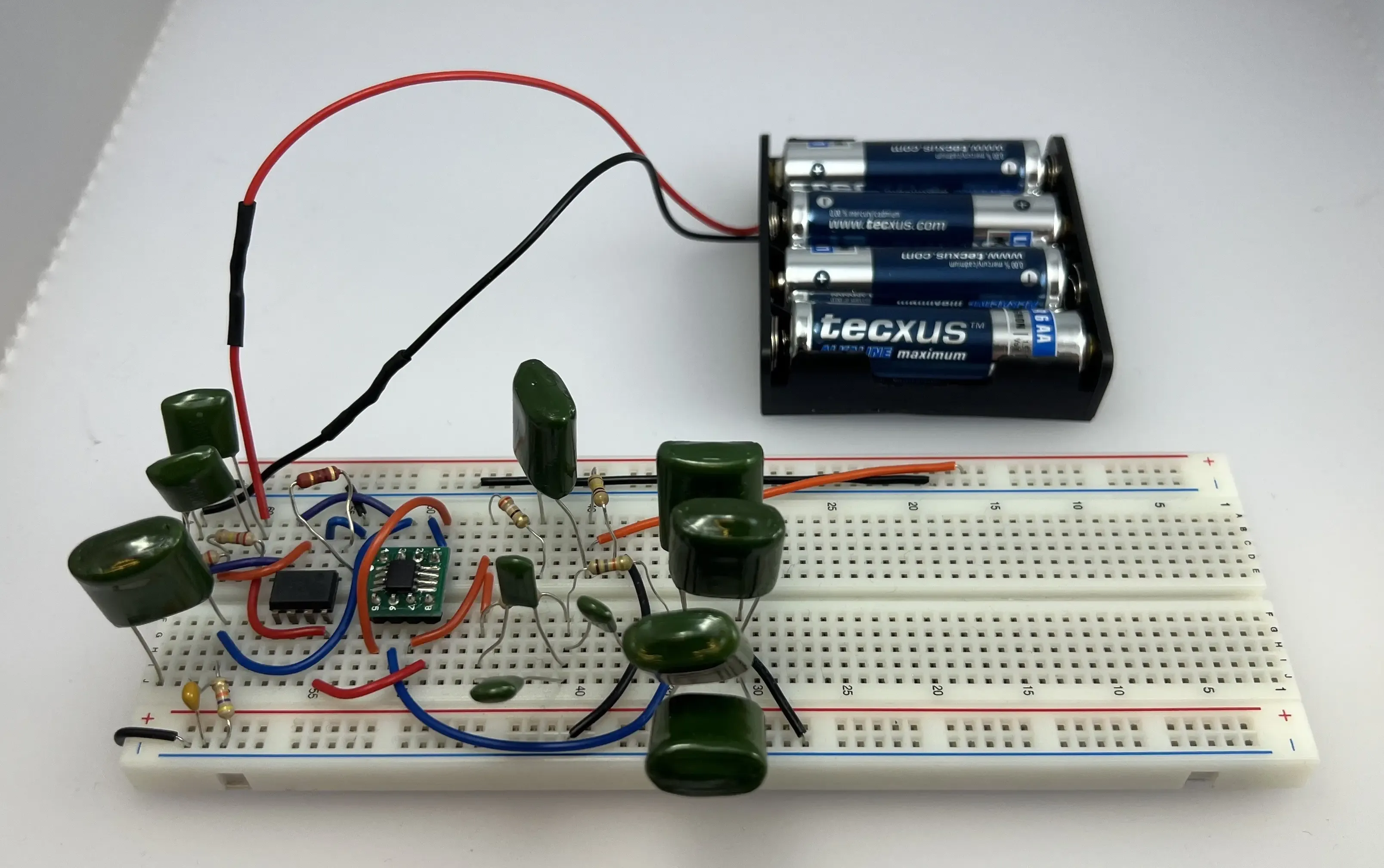 A breadboard prototype of the preamplifier circuit built with throughole components.