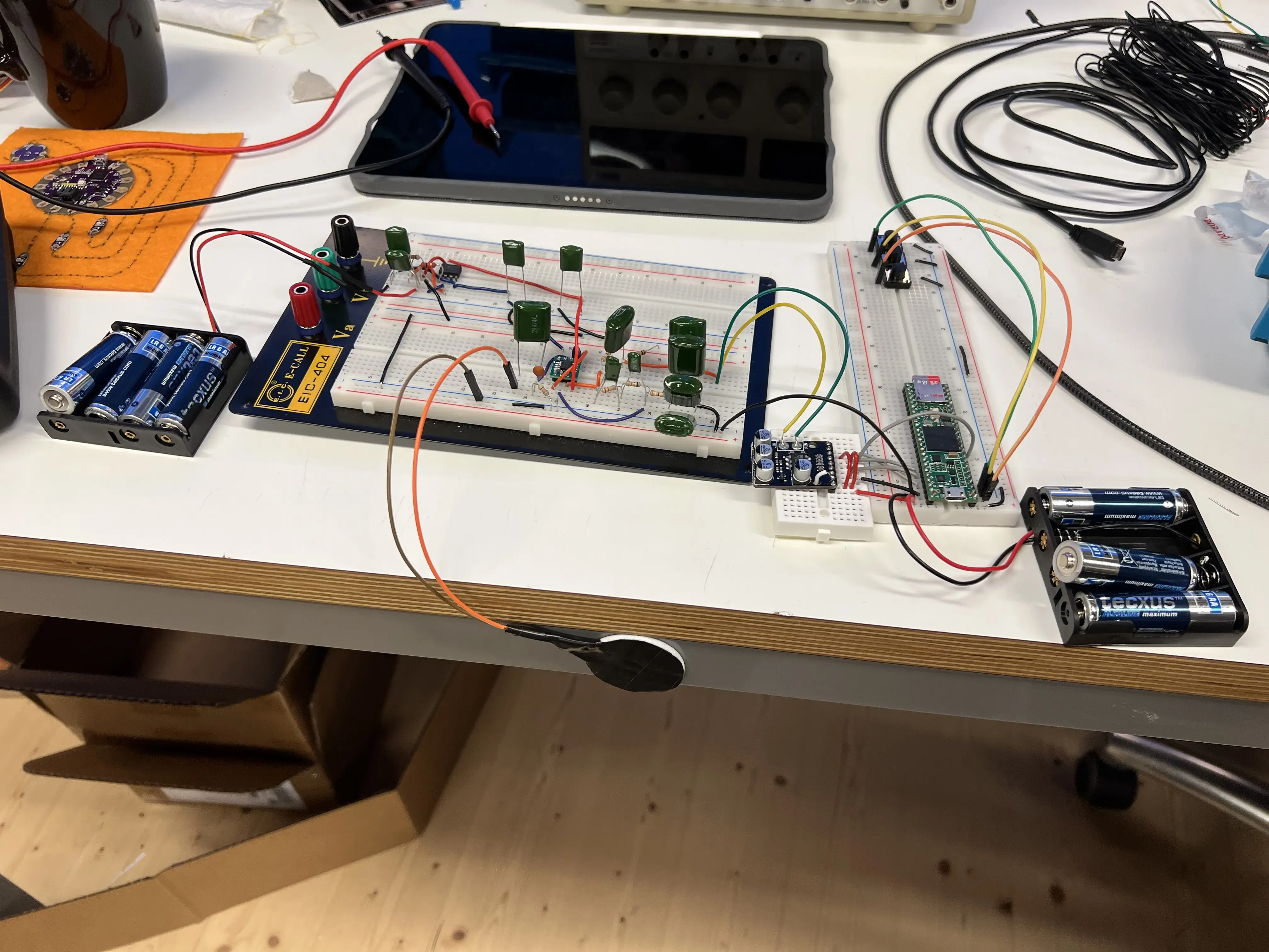 Breadboard prototype of the preamplifier circuit and the Teensy 4.1 used to test audio recording.